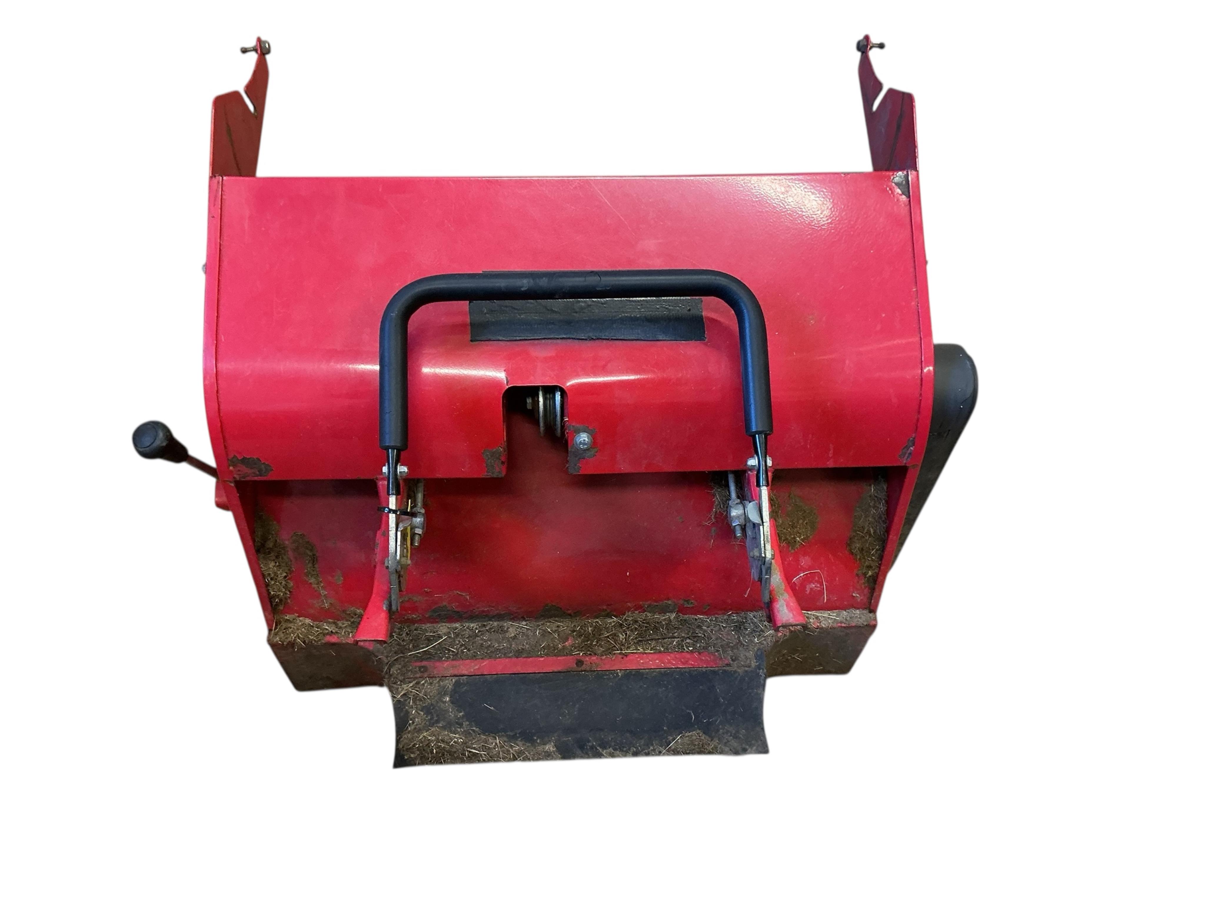 A Westwood S1300 ride on mower with scarifier and brass box attachments